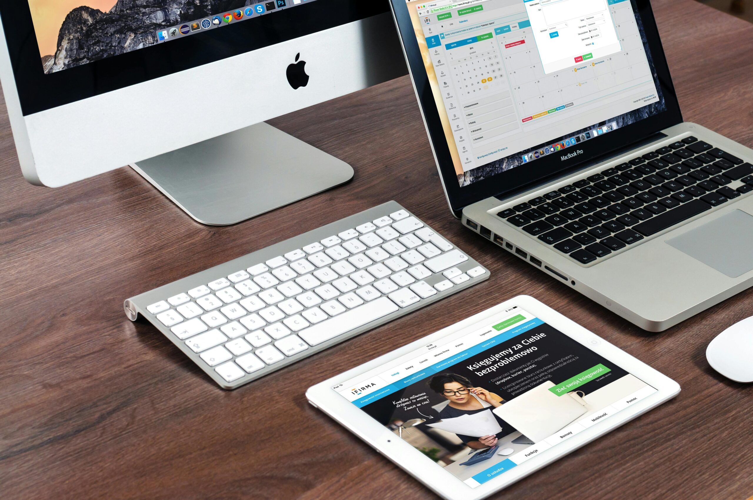 image showing a web designers desk with a calendar and testing a wireframe for a client